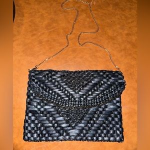 Anthropologie black oversized raffia clutch
